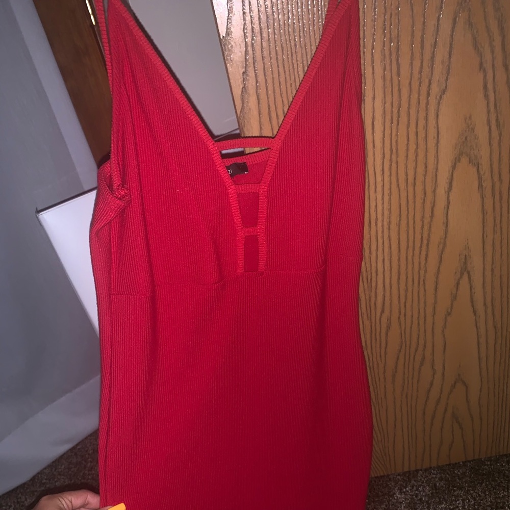 Red small tight dress.